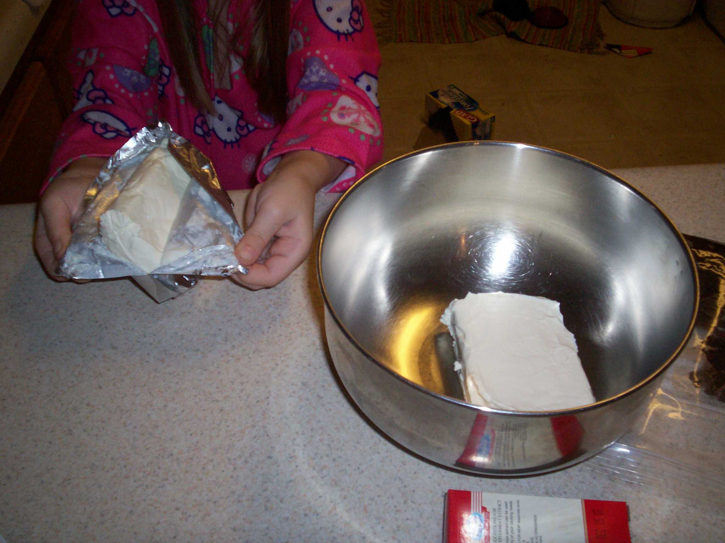 cream cheese in a metal bowl