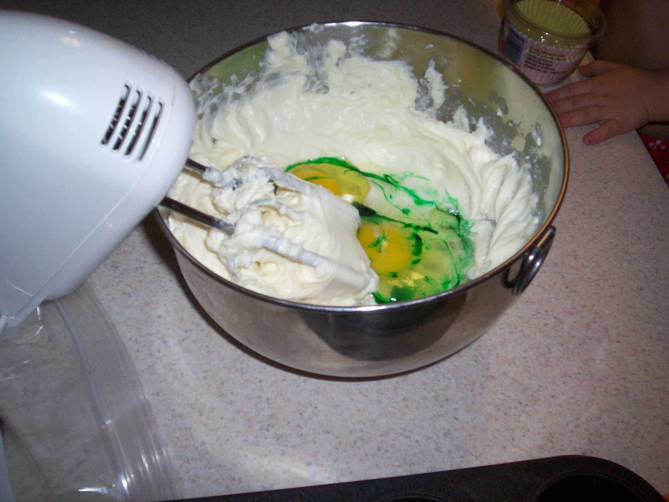 eggs and green color added to cream cheese mixture
